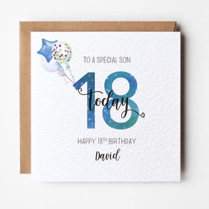May include: A birthday card with a brown envelope. The card has the text "TO A SPECIAL SON 18 today" with a blue and green color scheme. The card also says "HAPPY 18TH BIRTHDAY David" and features balloon illustrations.