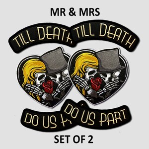 May include: Set of two black and gold embroidered patches with a skull couple in a heart and the text "Till Death Do Us Part".