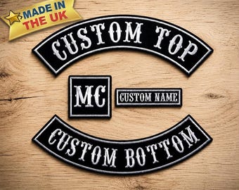 May include: A set of four black embroidered patches with white borders and white lettering. The top and bottom patches are curved with the text CUSTOM TOP and CUSTOM BOTTOM. A square patch features the letters MC, and a rectangular patch reads CUSTOM NAME.