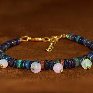 AAA Ethiopian Opal Bracelet: Rondell Black Opal Beads, 925 Sterling Silver.
