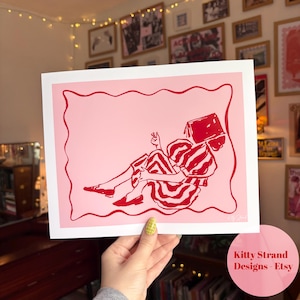 Stampa artistica di libri - Stampa artistica orizzontale - Stampa artistica sopra il letto - Stampa artistica con linee rosse e rosa - Stampa artistica con linee femminili continue - Arte accogliente