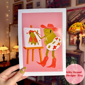 Stampa artistica di una rana cowgirl - Regalo per artista - Decorazione murale rosa per camera da letto - Decorazione murale western - Arte per soggiorno - Graziosa decorazione murale - Regalo rana per lei