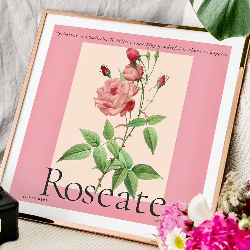 Gold frame with pink vintage art print of a hand painted watercolour rose. Text reads Roseate