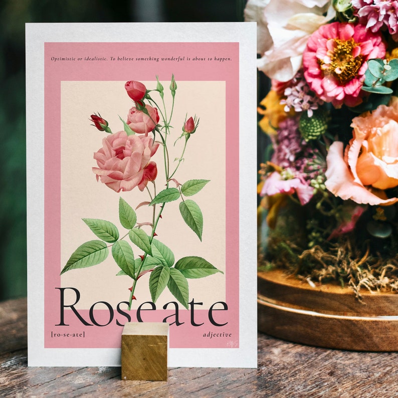 A5 pink floral art print next to a bouquet of flowers