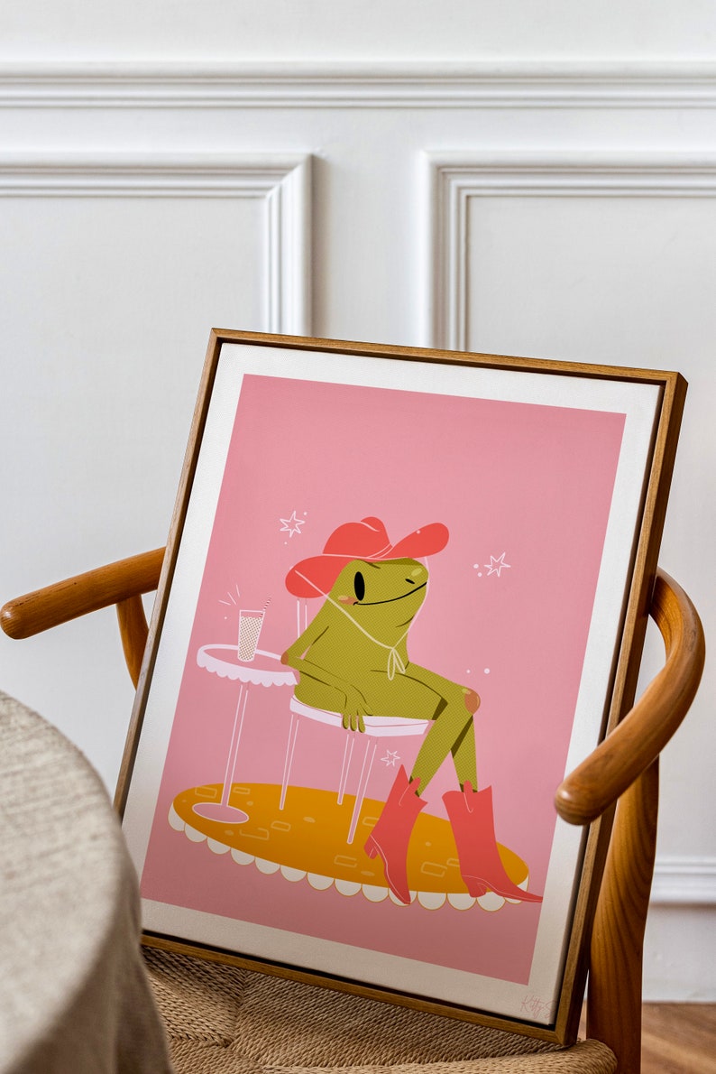 mid-century dining chair with A3 pink frog poster