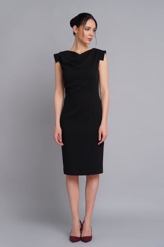 Black dress with asymmetrical neckline 2025