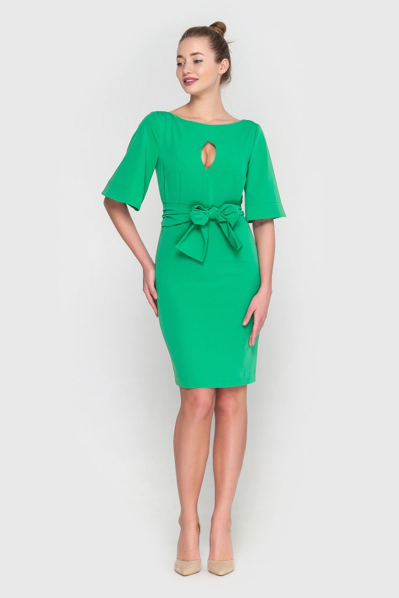 Kelly Green flutter sleeve peplum  mini dress