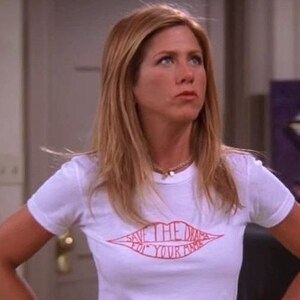 May include: A white t-shirt featuring a red lip design with the words "SAVE THE DRAMA FOR YOUR MAMA". The shirt has short sleeves and is worn by a person with blonde hair.