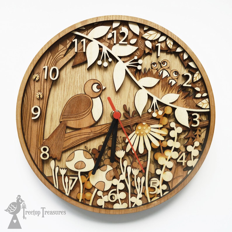 May include: A wooden clock with a bird and floral design. The clock face has Roman numerals and a red second hand. The clock is made of wood and has a natural finish.