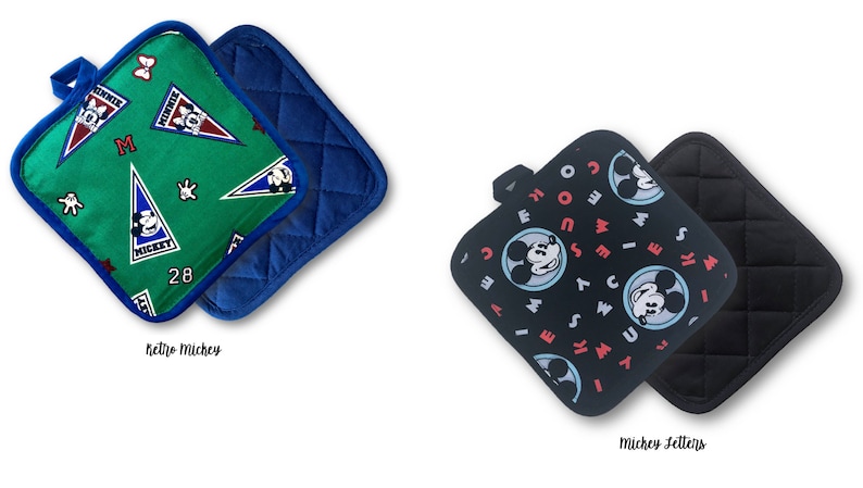 May include: Two sets of pot holders. The first set has a green background with a blue border and a pattern of Mickey Mouse in red, white, and blue. The second set has a black background with a blue border and a pattern of Mickey Mouse in red, white, and blue. The text "Retro Mickey" is below the first set and "Mickey Setters" is below the second set.