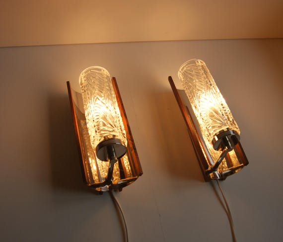Pair of Swedish vintage wall lamps - elegant design in crystal glass, teak and chrome - 1960s.