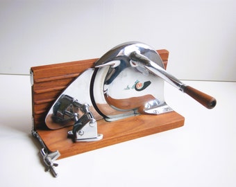 Rare teak and chrome Eva bread slicer - iconic household design from Denmark. 1950s.