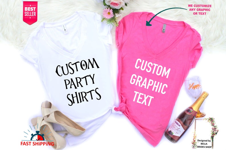 May include: Two V-neck t-shirts, one white and one pink, with the text "CUSTOM PARTY SHIRTS" on the white shirt and "CUSTOM GRAPHIC TEXT" on the pink shirt.