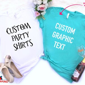 May include: Two white t-shirts with black text. One shirt says "Custom Party Shirts" and the other says "Custom Graphic Text".