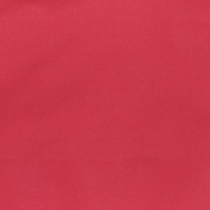 Könnte beinhalten: Ein einfarbiger, leuchtend roter Stoff mit glatter Textur.