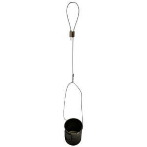May include: A black metal hanging planter with a black metal chain and a brass hook. The planter is empty.