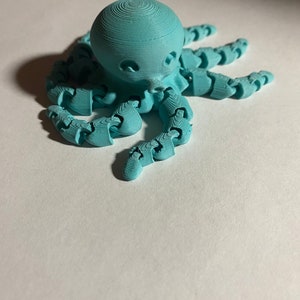 Fully articulated octopus fidget toy