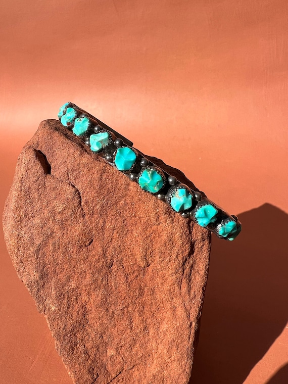 Zuni Carved Turquoise Nugget Sterling Row Cuf