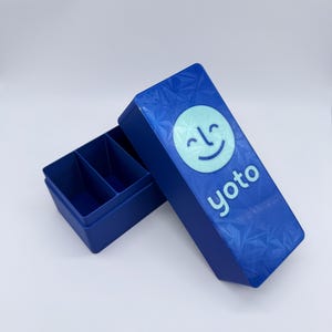 Boîte en carton Yoto, imprimée en 3D avec du plastique