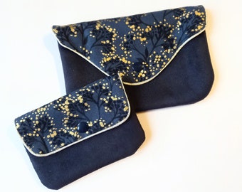 Duo of black pouches, suede and gold floral fabric