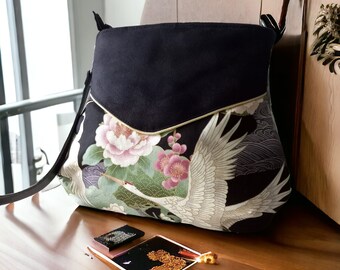 Black round pear bag and Japanese fabric with flowers and cranes, leather shoulder strap