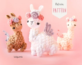 May include: Three crocheted llama amigurumi toys with flower crowns. The llamas are white, brown, and pink. The white llama has purple wings. The text "Patrón PATTERN" is in the upper right corner of the image.