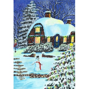 May include: A snowy winter scene with a small cottage covered in snow. The cottage has a blue door and lit windows. A snowman stands in the front yard with a red scarf.