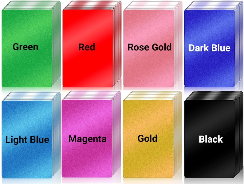 May include: Eight stacks of playing cards in various colors: green, red, rose gold, dark blue, light blue, magenta, gold, and black. Each stack has the color name printed in white.