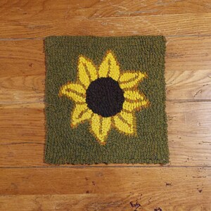 Large leaf sunflower on primitive green back ground  Primitive Hand  Hooked Rug by Sharon Fitzpatrick Perry (10 X 10 inches)