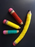 Pencil cat toy with catnip and cotton filling, and mini bell. Cat lover fun gift idea. Marty Merlin Crochet product logo