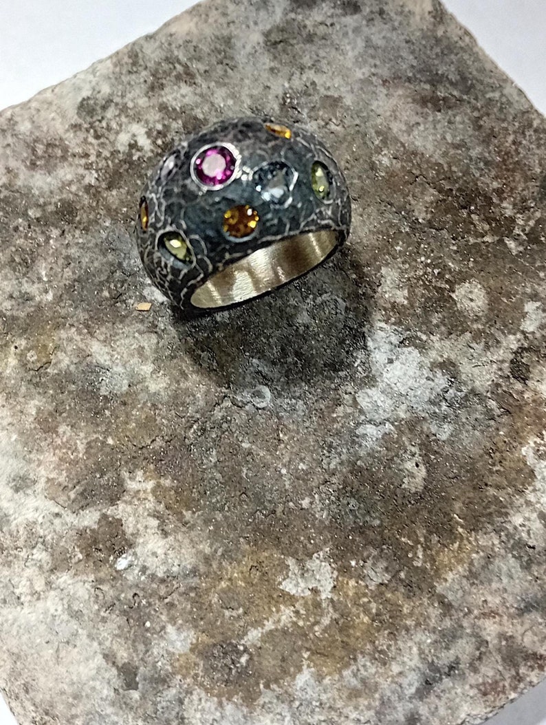 Pyramid band ring with multi-cut and color stones made of oxidized silver