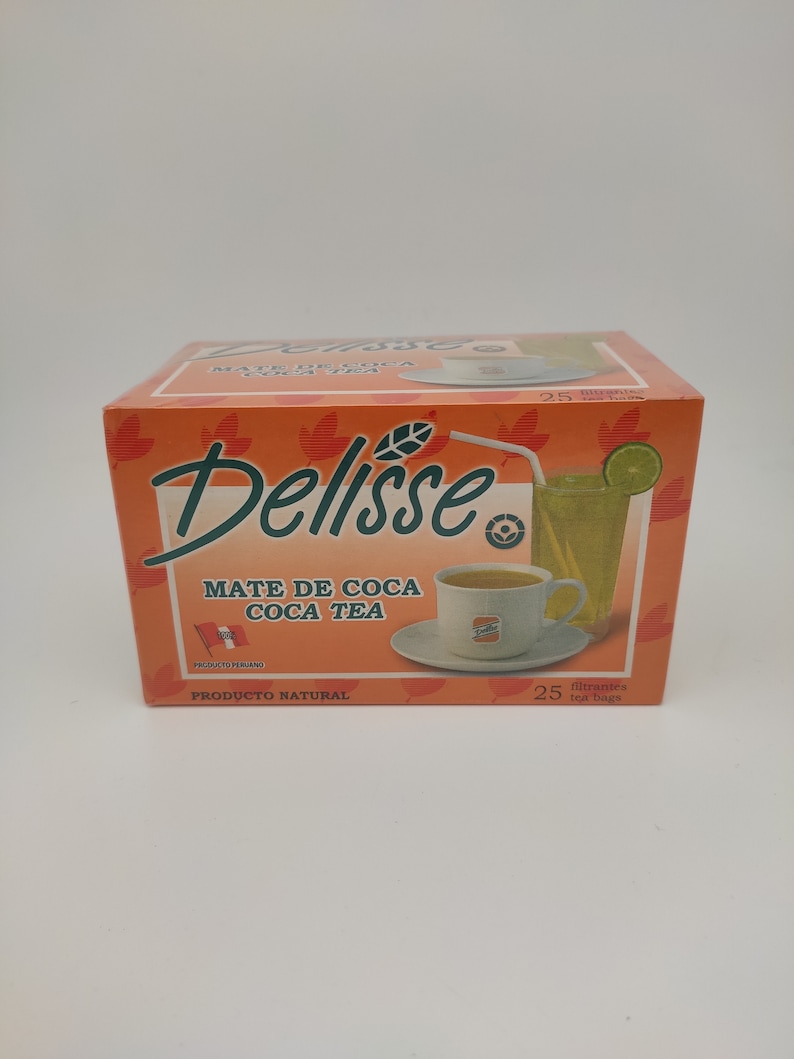 May include: A box of Delisse Mate de Coca Coca Tea, a natural product from Peru. The box features an illustration of a cup of tea and a glass of iced tea with a lemon wedge. The text on the box reads "Delisse Mate de Coca Coca Tea, Producto Peruano, Producto Natural, 25 filtrantes tea bags."