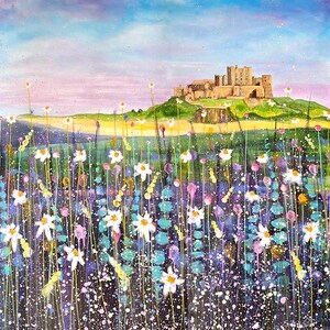 May include: An artistic painting of a castle on a hill, with a beach and sea in the background. The foreground is filled with white daisies and wildflowers in shades of purple and blue. The sky is a mix of blue and pink.