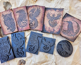 May include: A set of nine woodblock stamps featuring various mythical creatures, including owls, ravens, and phoenixes. The stamps are carved with intricate designs and are ready to be used for crafting and art projects.