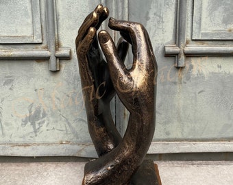 The Cathedral sculpture, inspired by Auguste Rodin work, Cast iron sculpture on wooden base