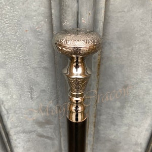 elegant walking stick, classic cane, wood and metal