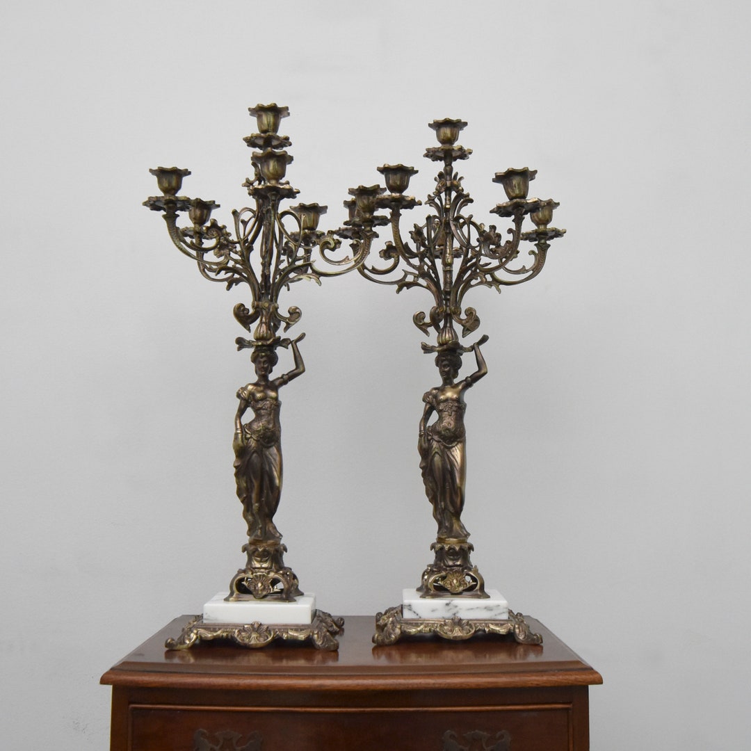 Set of Two Brass Fivebranched Candelabras, Large Figural Candle