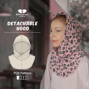 May include: A detachable hood sewing pattern featuring a pink fabric with a dark grey leopard print. The image displays a technical line drawing of the hood and a photograph of the hood worn over a light pink shirt. Text reads MOKUSHART patterns.