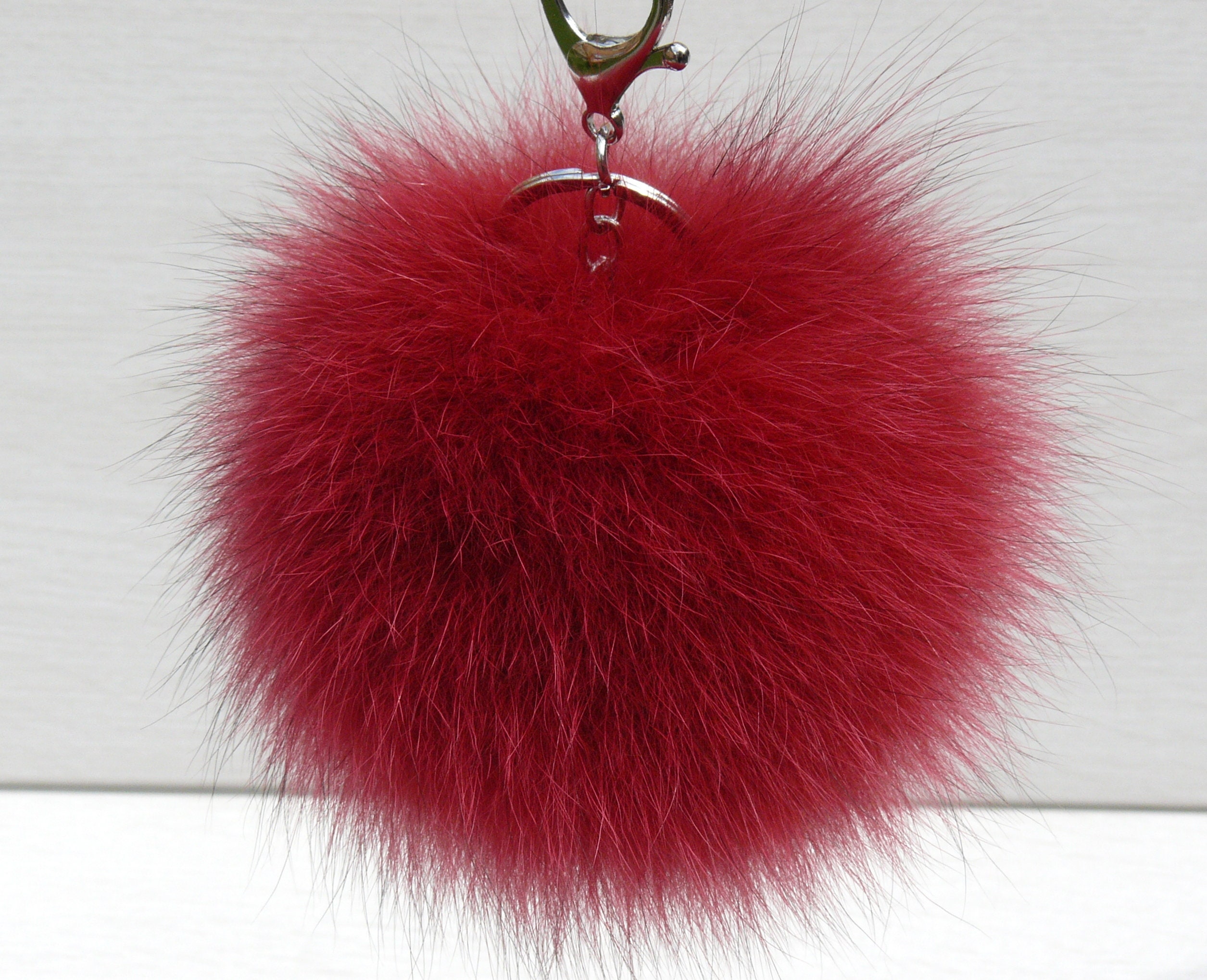 ZHSH 3.5 inches Fox Fur Pom Pom Keychain for Women, Silk Ribbon Bow Scarf  Charm Accessory with Golden Keyring for Backpack Handbag (B) at   Women's Clothing store