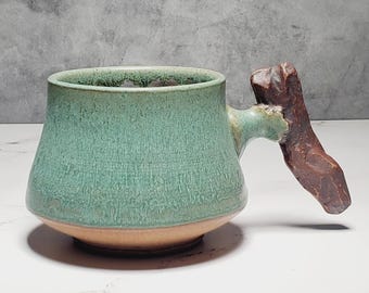 Handmade Stoneware Coffee Mug – Rustic Green Ceramic Cup with Driftwood Handle