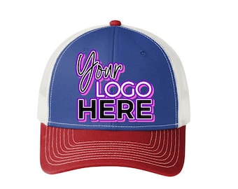 May include: A baseball cap with a red brim, a blue crown, and a white mesh back. The cap features the text "Your LOGO HERE" in a stylized font. The top button is red.