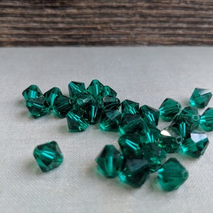 Swarovski (8mm) Emerald Bicone beads dark green 25 Pieces jewelry making, couture embellishments Craft or Jewelry by JewelsCharmsMore