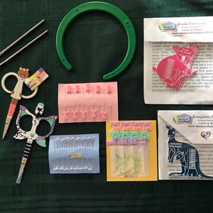 Bobbin Lace Tools- Crochet hooks various sizes 2.00-4.50, Horseshoe 6.50, Pin Gauges 6.50, Scissors 7.50, Divider Pins 1.50