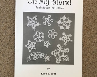 Libro de frivolité 21.50 ¡Oh My Stars! Técnicas para frivolité de Kaye B. Judt. 17 patrones de estrellas, incluyendo frivolité de dos colores, zigzag y más.