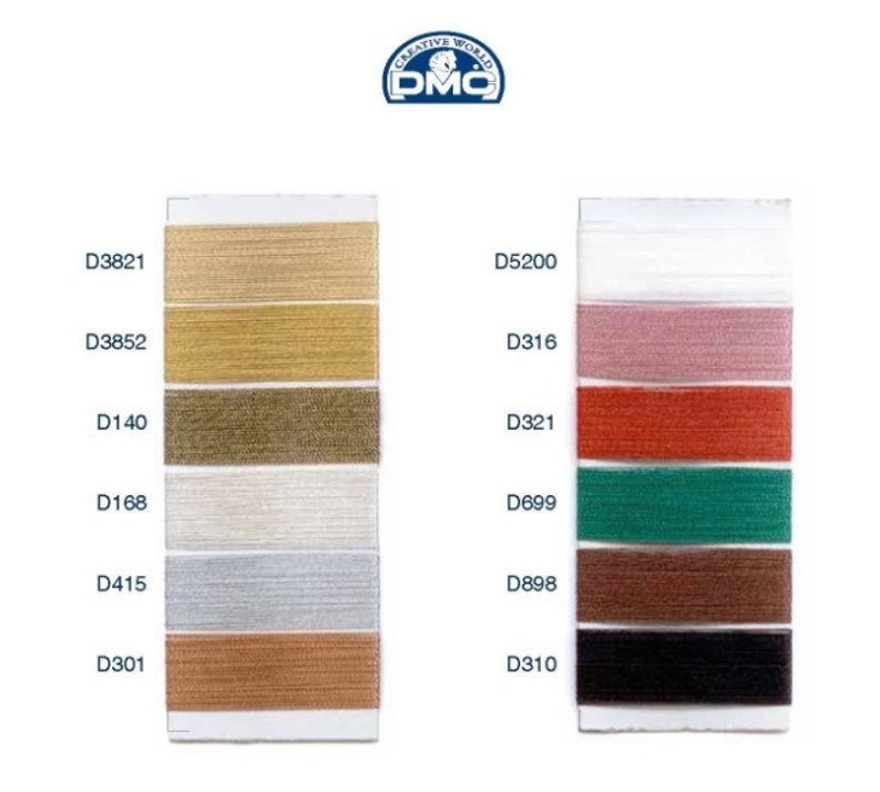 May include: A color chart with DMC embroidery floss samples. The chart shows 10 different colors of floss, including gold, brown, white, red, green, and black. The floss numbers are listed next to each color sample.