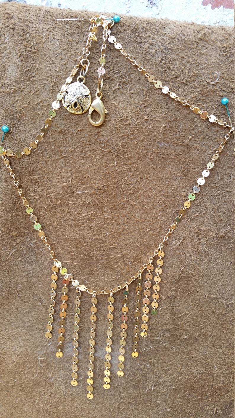 Sun Drops A 14K Shower of drops of glittering sun on gold-filled dots It/'s the simplicity of the design that makes this set so special.
