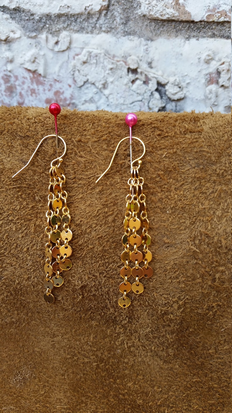 Sun Drops A 14K Shower of drops of glittering sun on gold-filled dots It/'s the simplicity of the design that makes this set so special.
