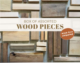 May include: A box of assorted wood pieces in various shapes and sizes. The wood pieces are in different shades of brown and beige. The box includes the text "BOX OF ASSORTED WOOD PIECES" and "With free shipping".
