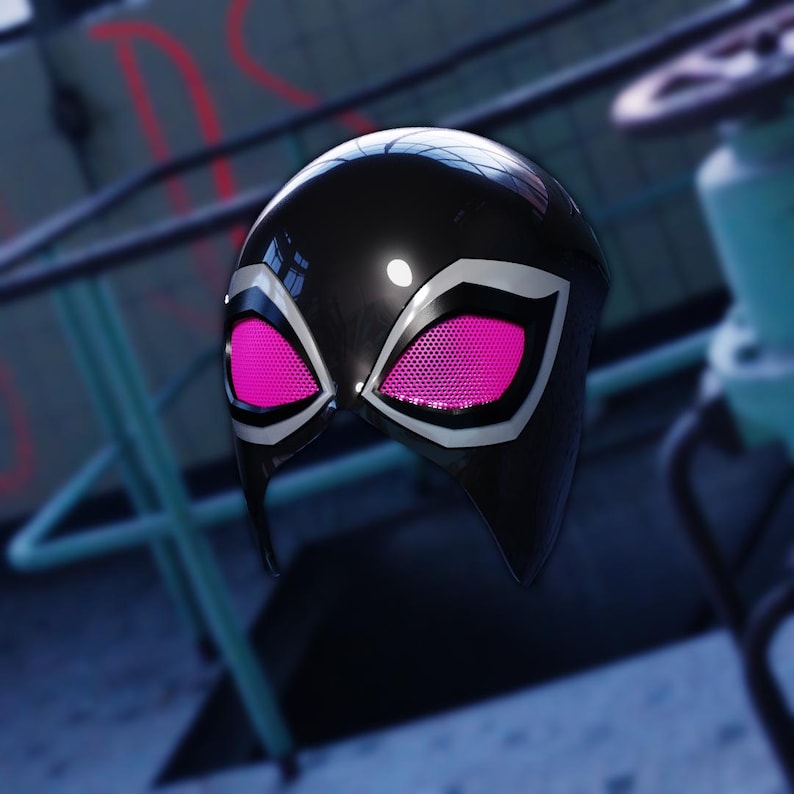 May include: A black mask with a glossy finish, featuring white accents and vibrant pink mesh eye coverings. The mask has a sleek, aerodynamic design, suggesting a superhero or futuristic theme.