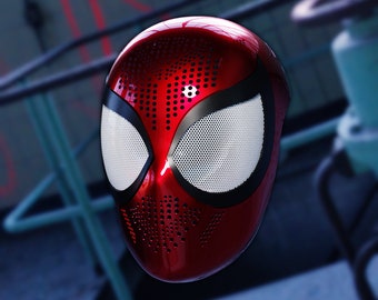 May include: A red and black Spider-Man mask with a white mesh eye piece. The mask has a textured surface with small dots.